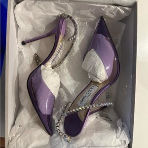 Brand New never Worn Jimmy Choo heels comes with box bag and everything